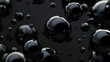 Black oil drops on a black background.