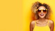 © Leli - Summer background of A woman wearing a yellow tank top and sunglasses
