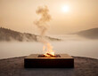 ©  Photinia Art - Large fire pit on the sand, against a foggy landscape background.