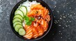Bowl of Salmon and Rice With Cucumbers