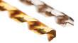 Two different colored drill bits are shown side by side. The gold one is on the left and the silver one is on the right