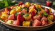Bowl of Fruit Salad With Strawberries and Pineapples
