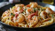 Bowl of Shrimp and Pasta on Table