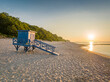 Lifeguard hut at sunrise on beach by Baltic Sea