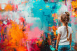 © dreamalittledream - Blond child girl in front of a colorful abstract background wall, handprinted childrens artwork, kids creativity, education, imagination, space for text, design, graphic resource, negative space
