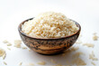 Rice in a bowl on a white background.
