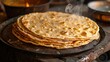 © we3_food - Chapati, traditional tortillas with fresh parsley . Generative Ai