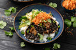 Korean mushrooms bowl with cucumber salad, kimchi and rice