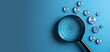 © DWN Media - Photo of a magnifying glass over target audience icons on a blue background, showing a customer profile concept for business and marketing planning