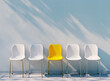 five minimalist chairs in a row with one standout yellow chair against a blue wall, hiring concept
