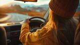 Fototapeta  - Close up of unrecognizable woman holding her hand on automatic gearshift while driving a car