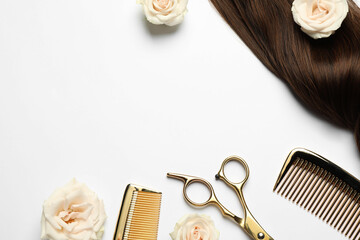 Wall Mural - Hairdresser tools. Brown hair lock, combs, scissors and flowers on white background, flat lay. Space for text