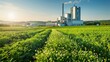 © Paul - Panoramic view of a modern biomass power plant, surrounded by fields of biofuel crops, under a clear sky
