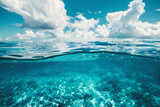 Fototapeta Motyle - Underwater view of blue ocean water surface with white clouds and blue sky, Generative Ai