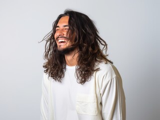 Wall Mural - A man with long hair is smiling and laughing