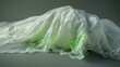 A piece of classic, white lace, draped elegantly, with an unexpected twist of neon green glow-in-the-dark paint splatters, marrying tradition with modernity and glow. 