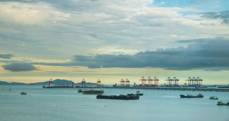 Wall Mural - Time-lapse Logistic shipping quay boat Engineering crane depot at logistic export terminal control. Warehouse freight container yard loading quayside harbor port. Multiple Exposure Motion timelapse