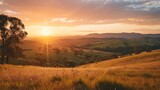 Fototapeta Na sufit - a sunset over the tranquil countryside, reveals rolling hills bathed in warm hues, offering a serene retreat for those seeking solace in nature's embrace