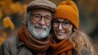 © Julia Jones - Portrait of elderly man and middle-aged woman with autumn leaves background