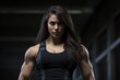 © Balaraw - Muscular woman with determined expression