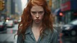 © Balaraw - Intense gaze of a young woman with red curly hair