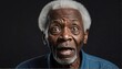handsome african elderly man surprised amazed expressi suprised amazed expression on plain black background from Generative AI