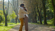 Multiethnic happy married couple in love hugging in park loving man woman enjoy embrace romantic date in nature family relationships african american guy hug indian girl outdoors tenderness affection