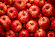 Fresh red whole apples as seamless background