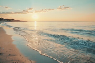 Wall Mural - Sunset over calm sea with sandy shore