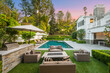 © Wirestock - Poolside patio with outdoor dining table in a new construction home in Encino, California