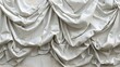 Elegant White Fabric Draped Gracefully with Subtle Textures