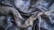 Elegant Blue Fabric Texture with Delicate Folds and Sheer Material