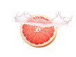 © TONSTOCK - a grapefruit with water splashing