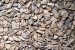 The background is made of small stone. The texture of crushed stone