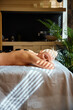 Mid adult woman having hot stones massage relaxing in spa