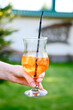 © Fostic - Apperol cocktail in hands