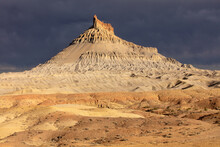 Colourful Factory Butte Summit In The Upper Blue Hills At Sunset With Deep Blue Sky In Utah, USA