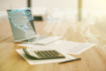 Wall Mural - multi exposure of abstract creative digital world map hologram on calculator and laptop background, 