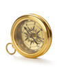 Retro magnetic compass on white background
