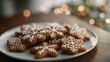 Christmas gingerbread cookies decorated with white icing on a plate