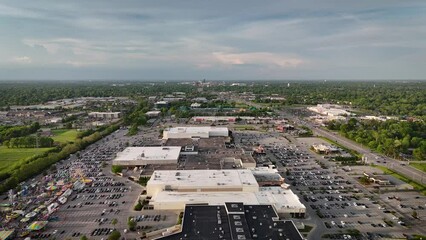 Wall Mural - Drone point of view of flying above Fayette mall and surrounding parking lots toward downtown midwestern city of Lexington, KY