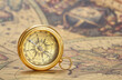 Brass magnetic compass on ancient map made by Henricus Hondius in 1630 