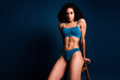 © deagreez - No filters photo of lovely girl in trendy lingerie sitting stool isolated on dark blue color background