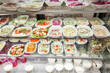 Various salads . Glass Showcase in a buffet or self-service restaurant.