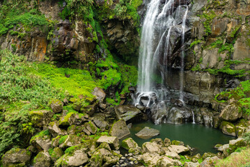 Wall Mural - Waterfall located on Sun Link Sea mountain in Taiwan