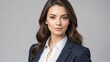 © Arceli - young brunette businesswoman studio portrait on plain white background from Generative AI