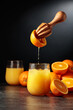 Orange juice is squeezed from fresh fruit.