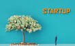 Successful businessman next to money tree, admiring the growth and profits. Background with copy space,. 3D rendering