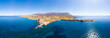 Beautiful beach and water bay in the greek spectacular coast of Peloponnese. Turquoise blue transparent water, unique rocky cliffs, Greece summer top travel destination. Aerial view.