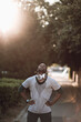 © Geber86 - Man with headphones resting after street run